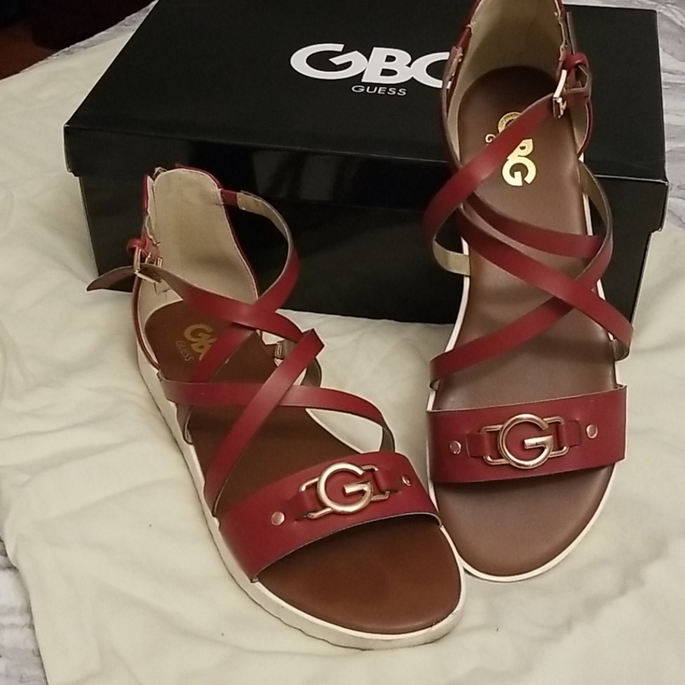 Guess red sandals.